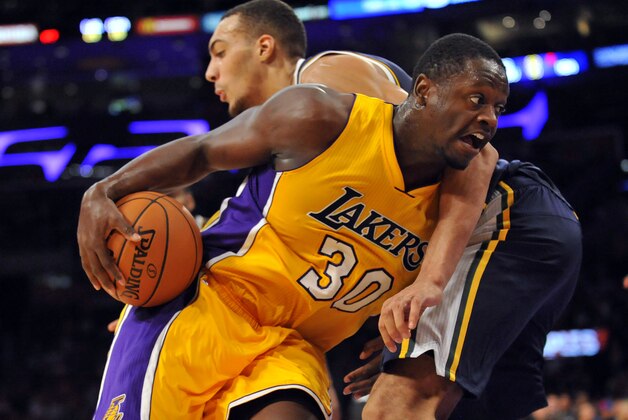 October 19, 2014; Los Angeles, CA, USA; Los Angeles Lakers forward Julius Randle (30) moves to the basket against the Utah Jazz during the second half  at Staples Center. Mandatory Credit: Gary A. Vasquez-USA TODAY Sports