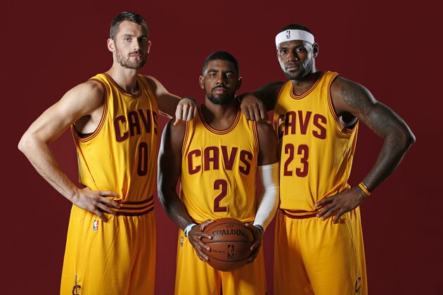 INDEPENDENCE, OH - SEPTEMBER 26:  Kevin Love #0, Kyrie Irving #2 and LeBron James #23 of the Cleveland Cavaliers poses for a photo during media day on September 26, 2014 at the Cleveland Clinic Courts in Independence, Ohio.  NOTE TO USER: User expressly acknowledges and agrees that, by downloading and or using this photograph, User is consenting to the terms and conditions of the Getty Images License Agreement. Mandatory Copyright Notice: Copyright 2014 NBAE  (Photo by Gregory Shamus/NBAE via Getty Images)