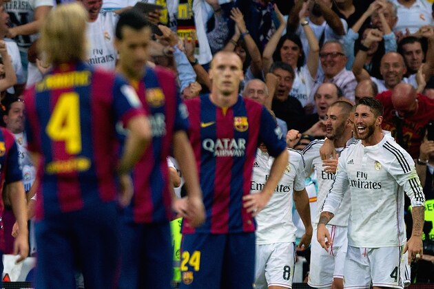 MADRID, SPAIN - OCTOBER 25:  Karim Benzema of Real Madrid CF celebrates scoring their third goal with Sergio Ramos of Real Madrid CF during the La Liga match between Real Madrid CF and FC Barcelona at Estadio Santiago Bernabeu on October 25, 2014 in Madrid, Spain.  (Photo by Gonzalo Arroyo Moreno/Getty Images)