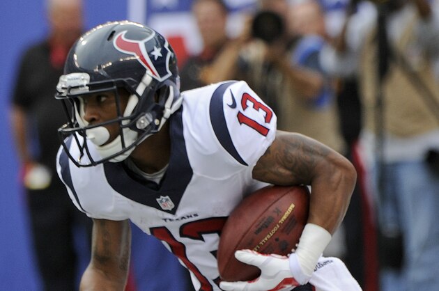 Houston Texans wide receiver Damaris Johnson (13) runs the ball out of the end zone on a kick-off return against the New York Giants in the fourth quarter of an NFL football game, Sunday, Sept. 21, 2014, in East Rutherford, N.J. (AP Photo/Bill Kostroun)