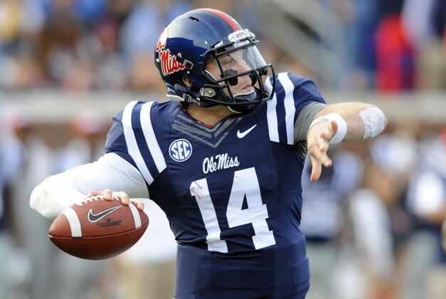 Oct 4, 2014; Oxford, MS, USA; Mississippi Rebels quarterback Bo Wallace (14) passes during the second half against Alabama Crimson Tide at Vaught-Hemingway Stadium. Mandatory Credit: Christopher Hanewinckel-USA TODAY Sports