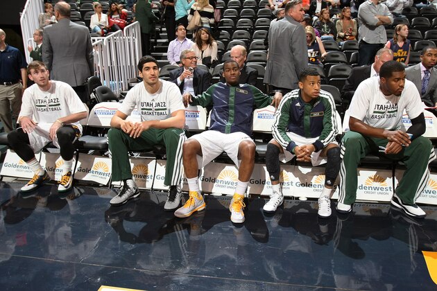 SALT LAKE CITY, UT - OCTOBER 07:  Gordon Hayward, Enes Kanter, Trey Burke, Dante Exum and Derrick Favors of the Utah Jazz Prepare for the game against the Portland Trail Blazers at EnergySolutions Arena on October 7, 2014 in Salt Lake City, Utah. NOTE TO USER: User expressly acknowledges and agrees that, by downloading and or using this Photograph, User is consenting to the terms and conditions of the Getty Images License Agreement. Mandatory Copyright Notice: Copyright 2014 NBAE (Photo by Melissa Majchrzak/NBAE via Getty Images)