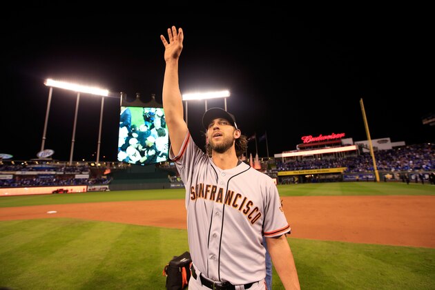 KANSAS CITY, MO - OCTOBER 29: Madison Bumgarner #40 of the San Francisco Giants acknowledges the crowd after defeating the Kansas City Royals to win Game Seven of the 2014 World Series by a score of 3-2 at Kauffman Stadium on October 29, 2014 in Kansas City, Missouri.  (Photo by Jamie Squire/Getty Images)