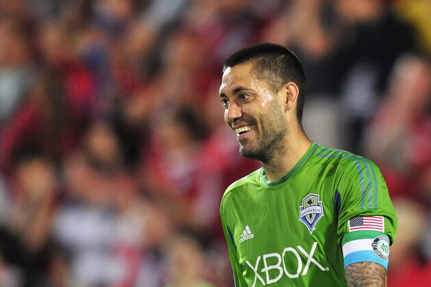 FRISCO, TX - APRIL 12:  Clint Dempsey #2 of the Seattle Sounders FC ACTION celebrates after scoring a goal against the FC Dallas on April 12, 2014 at Toyota Stadium in Frisco, Texas.  (Photo by Cooper Neill/Getty Images)