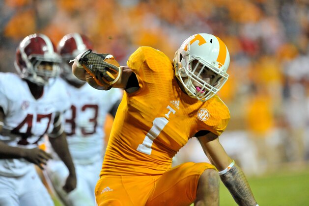 Oct 25, 2014; Knoxville, TN, USA; Tennessee Volunteers running back Jalen Hurd (1) rushes against the Alabama Crimson Tide during the first half game at Neyland Stadium. Mandatory Credit: Jim Brown-USA TODAY Sports