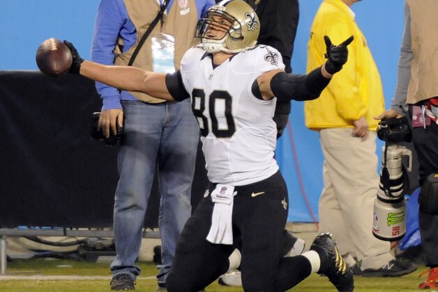 New Orleans Saints' Jimmy Graham (80) reacts after catching a touchdown pass against the Carolina Panthers in the first half of an NFL football game in Charlotte, N.C., Thursday, Oct. 30, 2014. (AP Photo/Mike McCarn)