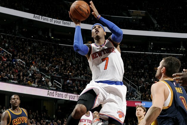 CLEVELAND, OH - OCTOBER 30: Carmelo Anthony #7 of the New York Knicks shoots against the Cleveland Cavaliers on October 30, 2014 in Cleveland, Ohio. NOTE TO USER: User expressly acknowledges and agrees that, by downloading and/or using this photograph, user is consenting to the terms and conditions of the Getty Images License Agreement. Mandatory Copyright Notice: Copyright 2012 NBAE (Photo by David Liam Kyle/NBAE via Getty Images)