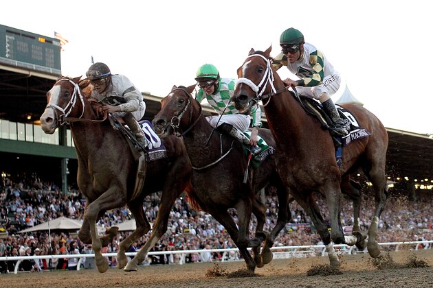 ARCADIA, CA - NOVEMBER 02:  Mucho Macho Man (right), riden by Gary Stevens crosses the finish line ahead of Will Take Charge, riden by Luis Saez and Declaration of War, riden by Joseph O'Brien, to win the Breeders' Cup Classic during the 2013 Breeders' Cup World Championships at Santa Anita Park on November 2, 2013 in Arcadia, California.  (Photo by Matthew Stockman/Getty Images)