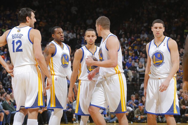 OAKLAND, CA - JANUARY 20: Andrew Bogut #12, Andre Iguodala #9, Stephen Curry #30, David Lee #10 and Klay Thompson #11 of the Golden State Warriors in a game against the Indiana Pacers on January 20, 2014 at Oracle Arena in Oakland, California. NOTE TO USER: User expressly acknowledges and agrees that, by downloading and or using this photograph, user is consenting to the terms and conditions of Getty Images License Agreement. Mandatory Copyright Notice: Copyright 2013 NBAE (Photo by Rocky Widner/NBAE via Getty Images)