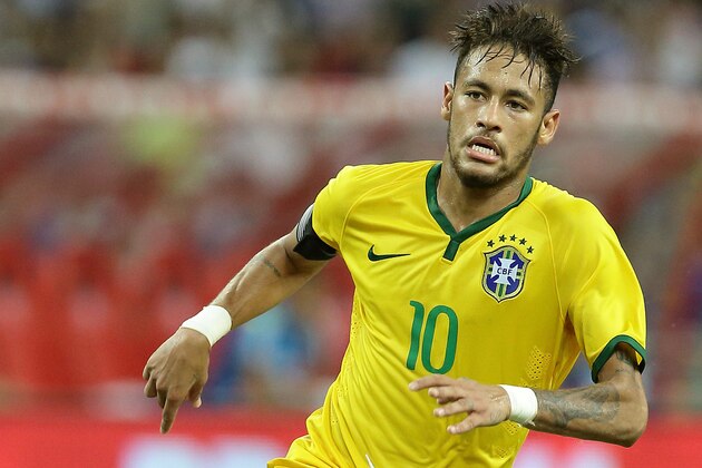 SINGAPORE - OCTOBER 14:  Neymar of Brazil in action during the international friendly match between Japan and Brazil at the National Stadium on October 14, 2014 in Singapore.  (Photo by Suhaimi Abdullah/Getty Images)