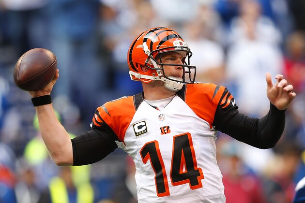 INDIANAPOLIS, IN - OCTOBER 19:  Andy Dalton #14 of the Cincinnati Bengals drops bad to throw a pass during the second quarter against the Indianapolis Colts on October 19, 2014 at Lucas Oil Stadium on October 19, 2014 in Indianapolis, Indiana. (Photo by Kirk Irwin/Getty Images)