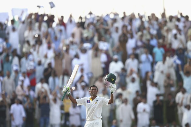 ABU DHABI, UNITED ARAB EMIRATES - OCTOBER 31:  Younis Khan of Pakistan celebrates after reaching his double centrury runs during Day Two of the Second Test between Pakistan and Australia at Sheikh Zayed Stadium at Sheikh Zayed stadium on October 31, 2014 in Abu Dhabi, United Arab Emirates.  (Photo by Ryan Pierse/Getty Images)