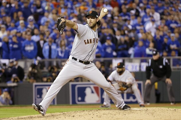 San Francisco Giants pitcher Madison Bumgarner throws during the fifth inning of Game 7 of baseball's World Series against the Kansas City Royals Wednesday, Oct. 29, 2014, in Kansas City, Mo. (AP Photo/David J. Phillip)