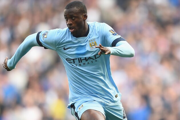 MANCHESTER, ENGLAND - SEPTEMBER 21:  Yaya Toure of Manchester City in action during the Barclays Premier League match between Manchester City and Chelsea at Etihad Stadium on September 21, 2014 in Manchester, England.  (Photo by Laurence Griffiths/Getty Images)