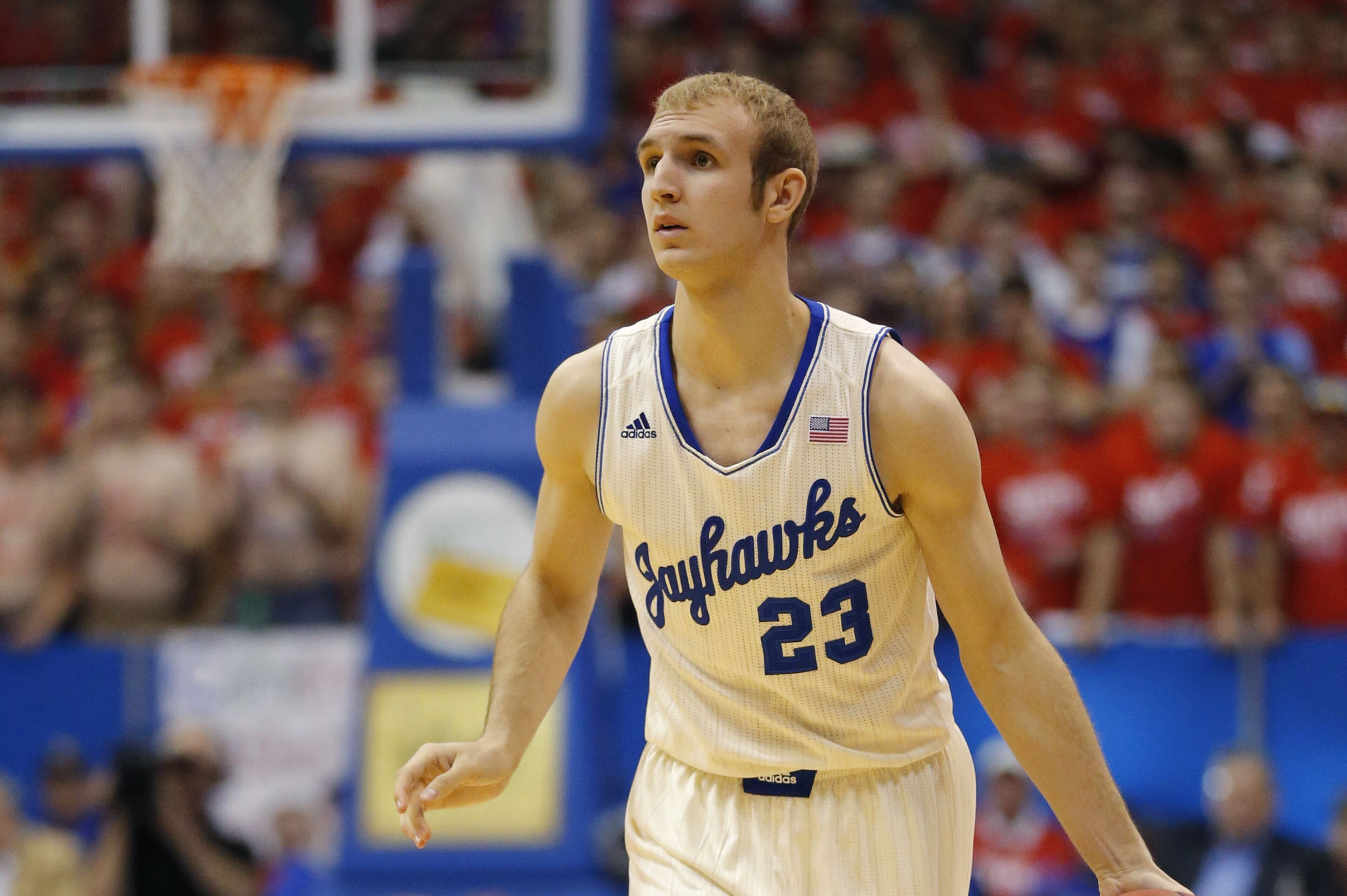Kansas guard Conner Frankamp (23) during the first half of an NCAA college basketball game at Allen Fieldhouse in Lawrence, Kan., Saturday, Jan. 18, 2014. (AP Photo/Orlin Wagner)