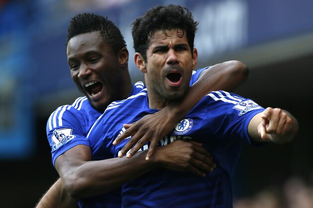 Chelsea's Diego Costa celebrates after scoring his sides second goal of the game during their English Premier League soccer match between Chelsea and Arsenal at Stamford Bridge stadium in London Sunday, Oct. 5, 2014. (AP Photo/Alastair Grant)