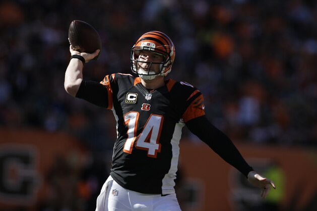 Cincinnati Bengals quarterback Andy Dalton throws against the Baltimore Ravens during the second half of an NFL football game in Cincinnati, Sunday, Oct. 26, 2014. (AP Photo/Darron Cummings)