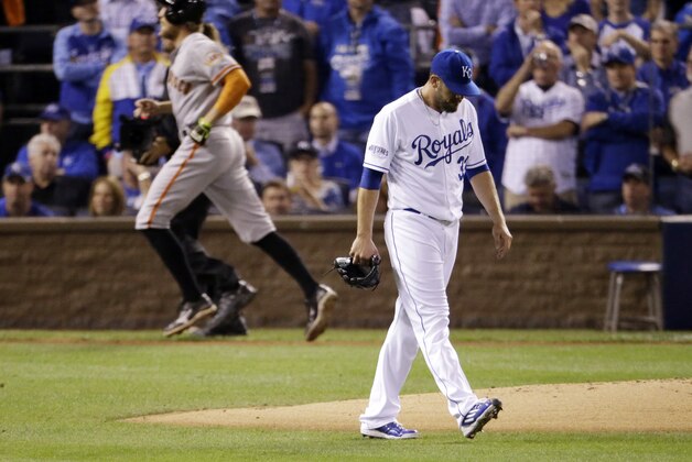 Kansas City Royals pitcher James Shields reacts after giving up a two-run home run to San Francisco Giants' Hunter Pence during the first inning of Game 1 of baseball's World Series Tuesday, Oct. 21, 2014, in Kansas City, Mo. (AP Photo/Charlie Riedel)