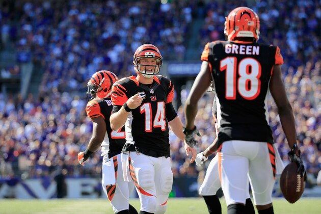 BALTIMORE, MD - SEPTEMBER 07:  Quarterback Andy Dalton #14 of the Cincinnati Bengals celebrates with wide receiver A.J. Green #18 after Green's game winning touchdown during an NFL football game against the Baltimore Ravens at M&T Bank Stadium on September 7, 2014 in Baltimore, Maryland.  (Photo by Rob Carr/Getty Images)