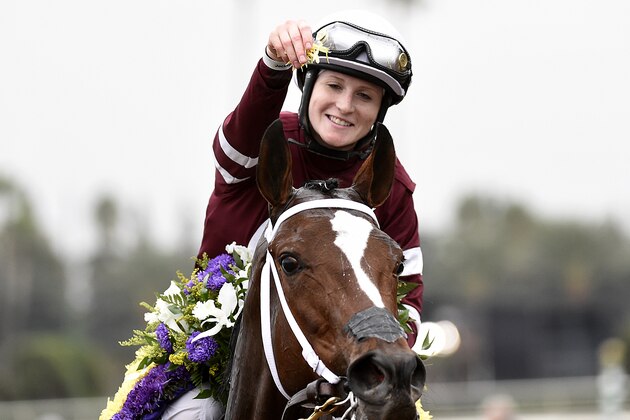 ARCADIA, CA - OCTOBER 31: Jockey Rosie Napravnik celebrates aboard Untapable after winning the Longines Breeders' Cup Distaff during 2014 Breeder's Cup at Santa Anita Park on October 31, 2014, in Arcadia, California. (Photo by Kevork Djansezian/Getty Images)