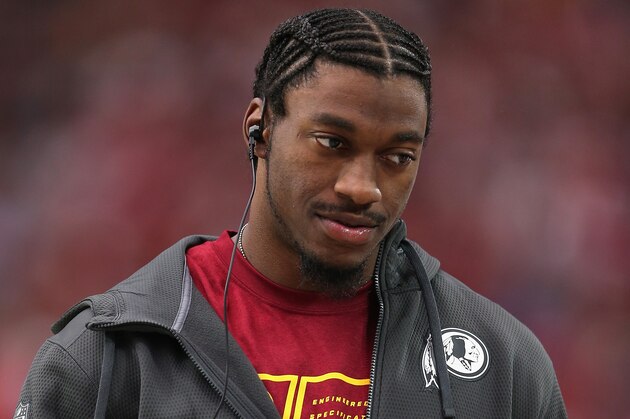 GLENDALE, AZ - OCTOBER 12:  Quarterback Robert Griffin III #10 of the Washington Redskins walks on the sideline during the NFL game against the Arizona Cardinals at the University of Phoenix Stadium on October 12, 2014 in Glendale, Arizona. The Cardinals defeated the Redskins 30-20.  (Photo by Christian Petersen/Getty Images)