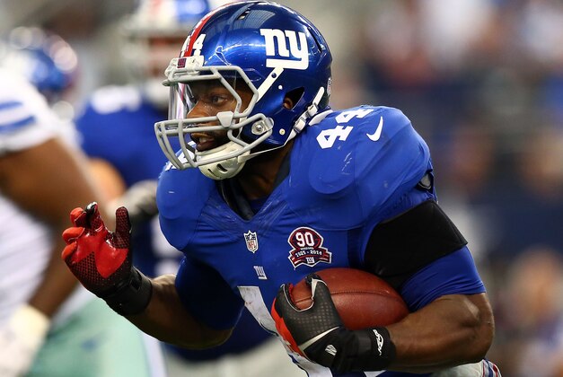 ARLINGTON, TX - OCTOBER 19:  Andre Williams #44 of the New York Giants carries the ball against the Dallas Cowboys in the second half at AT&T Stadium on October 19, 2014 in Arlington, Texas.  (Photo by Ronald Martinez/Getty Images)