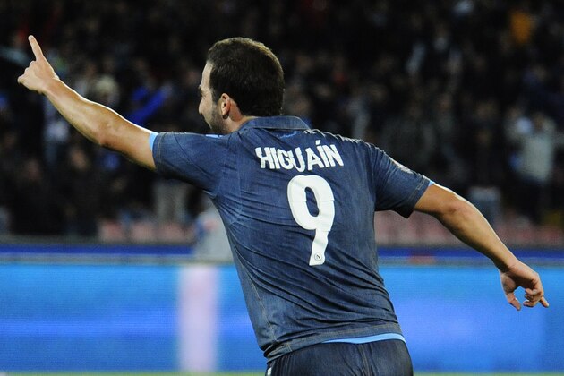 Napoli's Gonzalo Higuain celebrates after scoring during a Serie A soccer match between Napoli and Torino, at the San Paolo stadium in Naples, Italy, Sunday, Oct. 26, 2014.  Higuain scored three goals in Napoli 6 - 2 victory. (AP Photo/Salvatore Laporta)