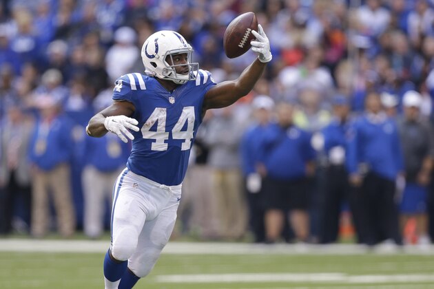 Indianapolis Colts running back Ahmad Bradshaw (44) makes a catch during the second half of an NFL football game against the Cincinnati Bengals Sunday, Oct. 19, 2014, in Indianapolis. (AP Photo/Michael Conroy)