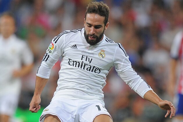 MADRID, SPAIN - AUGUST 19:  Daniel Carvajal of Real Madrid in action during the Supercopa first leg match between Real Madrid and Club Atletico de Madrid     at Estadio Santiago Bernabeu on August 19, 2014 in Madrid, Spain.  (Photo by Denis Doyle/Getty Images)
