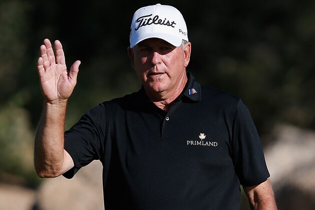 SCOTTSDALE, AZ - OCTOBER 31:  Jay Haas reacts to fans after a birdie putt on the 17th green during round two of the Charles Schwab Cup Championship on the Cochise Course at The Desert Mountain Club on October 31, 2014 in Scottsdale, Arizona.  (Photo by Christian Petersen/Getty Images)