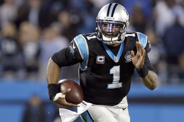 Carolina Panthers' Cam Newton (1) uses his legs to gain some yards against the New Orleans Saints during the second half of an NFL football game in Charlotte, N.C., Thursday, Oct. 30, 2014. The Saints won 28-10. (AP Photo/Bob Leverone)