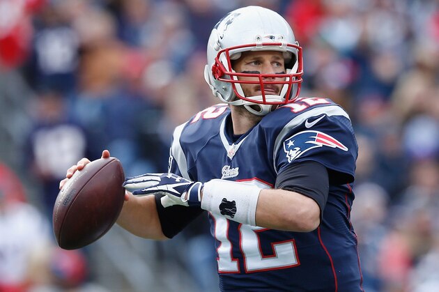 FOXBORO, MA - OCTOBER 26:  Tom Brady #12 of the New England Patriots passes the ball during the second quarter against the Chicago Bears at Gillette Stadium on October 26, 2014 in Foxboro, Massachusetts.  (Photo by Jim Rogash/Getty Images)