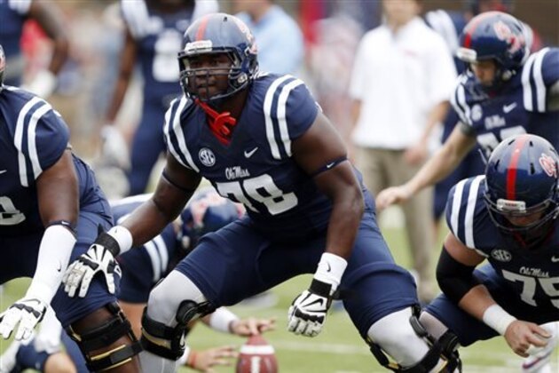 FILE - In this Sept. 13, 2014, file photo, Mississippi offensive linesman Laremy Tunsil (78) steps into his blocking stance during pre-game warmups prior to an NCAA college football game against Louisiana-Lafayette at Vaught-Hemingway Stadium in Oxford, Miss. The Rebels have rocketed from an SEC afterthought to the No. 3 team in the country by bringing in better talent, starting with a talented sophomore class that includes Robert Nkemdiche, Laquon Treadwell and Tunsil. (AP Photo/Rogelio V. Solis)