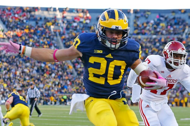 ANN ARBOR, MI - NOVEMBER 1: Drake Johnson #20 of the Michigan Wolverines scores during the third quarter of the game against Indiana Hoosiers at Michigan Stadium on November 1 , 2014 in Ann Arbor, Michigan. The Wolverines defeated the Hoosiers 34-10. (Photo by Leon Halip/Getty Images)