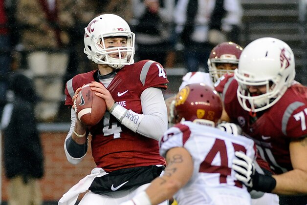 Nov 1, 2014; Pullman, WA, USA; Washington State Cougars quarterback Luke Falk (4) drops back for a pass against the Southern California Trojans during the second half at Martin Stadium. The Trojans won 44-17. Mandatory Credit: James Snook-USA TODAY Sports