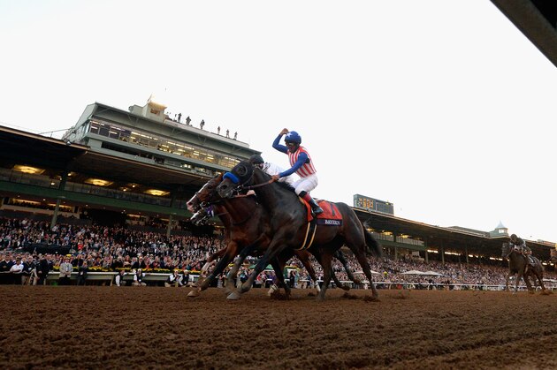 ARCADIA, CA - NOVEMBER 01:  Jockey Martin Garcia atop Bayern celebrates winning the 2014 Breeders' Cup Classic at Santa Anita Park on November 1, 2014 in Arcadia, California.  (Photo by Kevork Djansezian/Getty Images)