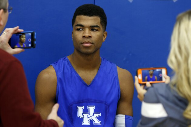 Kentucky's Andrew Harrison speaks to reporters during the team's NCAA college basketball media day, Thursday, Oct. 16, 2014, in Lexington, Ky. (AP Photo/James Crisp)