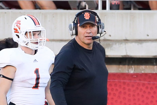 Aug 28, 2014; Salt Lake City, UT, USA; Idaho State Bengals head coach Mike Kramer walks on the sideline against the Utah Utes during the third quarter at Rice-Eccles Stadium. The Utes won 56-14. Mandatory Credit: Chris Nicoll-USA TODAY Sports