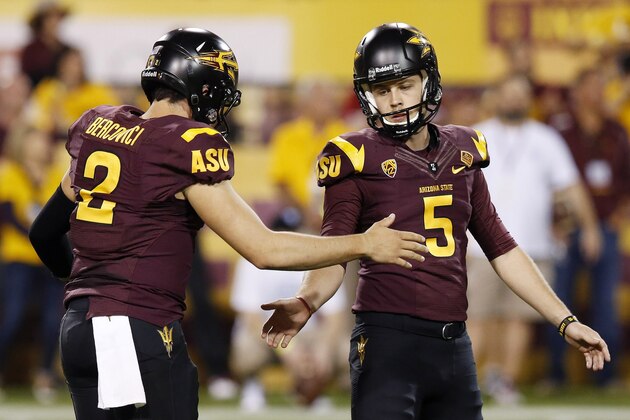 Arizona State's Zane Gonzalez (5) celebrates his field goal against Utah with teammate Mike Bercovici (2) in the first half of an NCAA college football game on Saturday, Nov. 1, 2014, in Tempe, Ariz. (Photo/Ross D. Franklin)