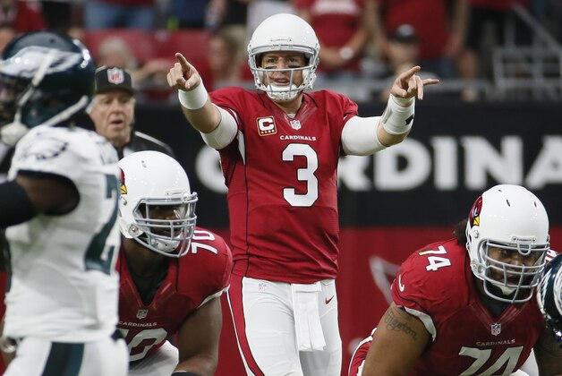 Arizona Cardinals quarterback Carson Palmer (3) calls a play against the Philadelphia Eagles during the first half of an NFL football game, Sunday, Oct. 26, 2014, in Glendale, Ariz. (AP Photo/Matt York)