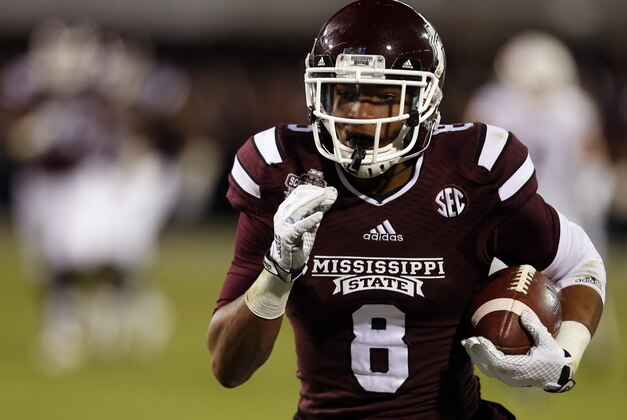 STARKVILLE, MS - NOVEMBER 1:  Fred Ross #8 of the Mississippi State Bulldogs catches a pass and takes it in for the touchdown against the Arkansas Razorbacks in the second half at Davis Wade Stadium on November 1, 2014 in Starkville, Mississippi. (Photo by Butch Dill/Getty Images)