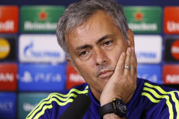 Chelsea's manager Jose Mourinho listens during a press conference at Cobham, England, Monday, Oct. 20, 2014. Chelsea will play Maribor in a Champions League Group G soccer match at Stamford Bridge stadium on Tuesday. (AP Photo/Kirsty Wigglesworth)
