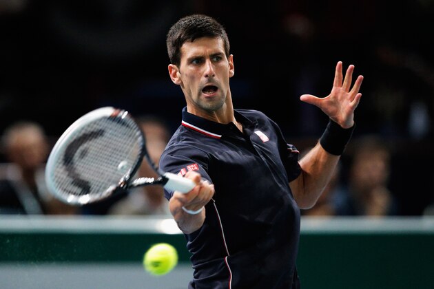 PARIS, FRANCE - NOVEMBER 01:  Novak Djokovic of Serbia in action against against Kei Nishikori of Japan in their semi final match during day 6 of the BNP Paribas Masters held at the at Palais Omnisports de Bercy on November 1, 2014 in Paris, France.  (Photo by Dean Mouhtaropoulos/Getty Images)