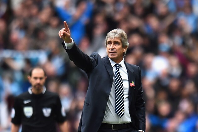 MANCHESTER, ENGLAND - NOVEMBER 02:  Manuel Pellegrini, manager of Manchester City on the touchline during the Barclays Premier League match between Manchester City and Manchester United at Etihad Stadium on November 2, 2014 in Manchester, England.  (Photo by Shaun Botterill/Getty Images)