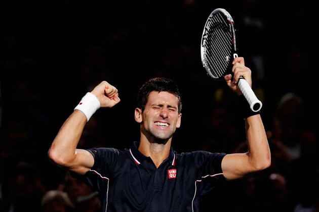 PARIS, FRANCE - NOVEMBER 02:  Novak Djokovic of Serbia celebrates after victory against Milos Raonic of Canada in their Final match during day 7 of the BNP Paribas Masters held at the at Palais Omnisports de Bercy on November 2, 2014 in Paris, France.  (Photo by Dean Mouhtaropoulos/Getty Images)