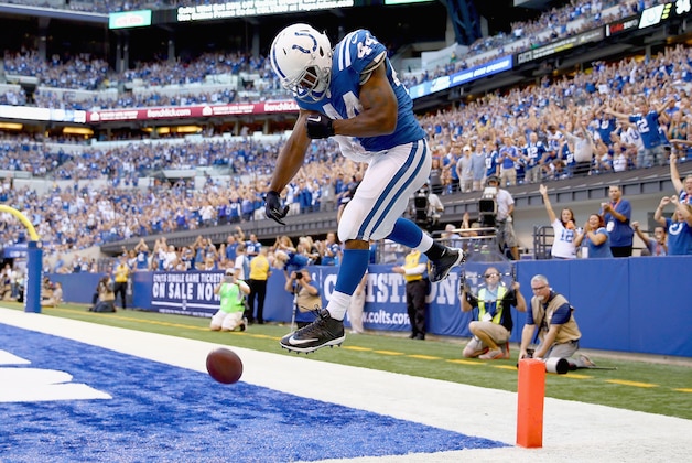 INDIANAPOLIS, IN - SEPTEMBER 28:  Ahmad Bradshaw #44 of the Indianapolis Colts celebrates after running for a touchdown during the game against the Tennessee Titans at Lucas Oil Stadium on September 28, 2014 in Indianapolis, Indiana.  (Photo by Andy Lyons/Getty Images)