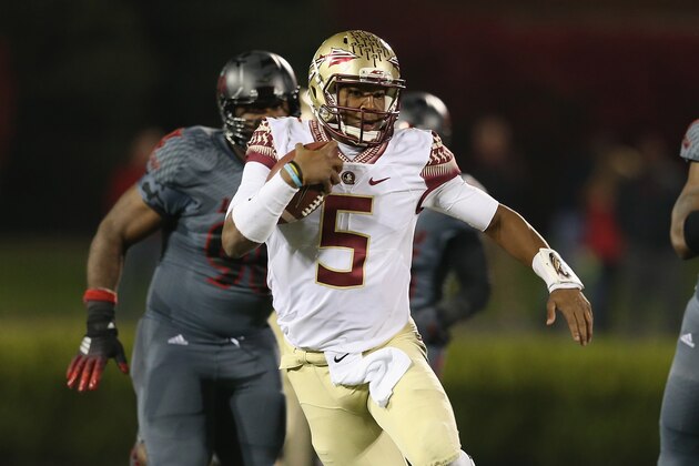 LOUISVILLE, KY - OCTOBER 30:  Jameis Winston #5 of the Florida State Seminoles runs with the ball during the game against the Louisville Cardinals at Papa John's Cardinal Stadium on October 30, 2014 in Louisville, Kentucky.  (Photo by Andy Lyons/Getty Images)