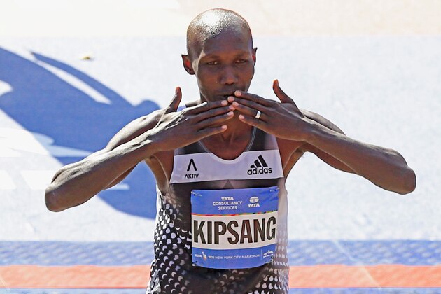 NEW YORK, NY - NOVEMBER 02:  Wilson Kipsang of Kenya celebrates after crossing the finish line to win the Pro Men's division during the 2014 TCS New York City Marathon in Central Park on November 2, 2014 in New York City.  (Photo by Alex Trautwig/Getty Images)