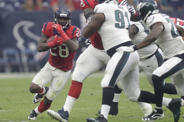 Houston Texans running back Alfred Blue (28) makes a run during the third quarter of an NFL football game, Sunday, Nov. 2, 2014, in Houston. (AP Photo/Patric Schneider)