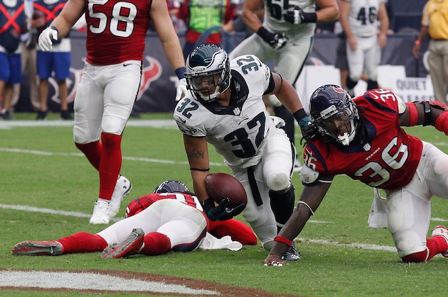 HOUSTON, TX - NOVEMBER 02:  Chris Polk #32 of the Philadelphia Eagles scores as D.J. Swearinger #36 of the Houston Texans is unable to keep him out of the endzone at Reliant Stadium on November 2, 2014 in Houston, Texas.  (Photo by Bob Levey/Getty Images)